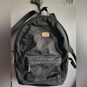 Michael Kors Black Backpack with Gold Accents